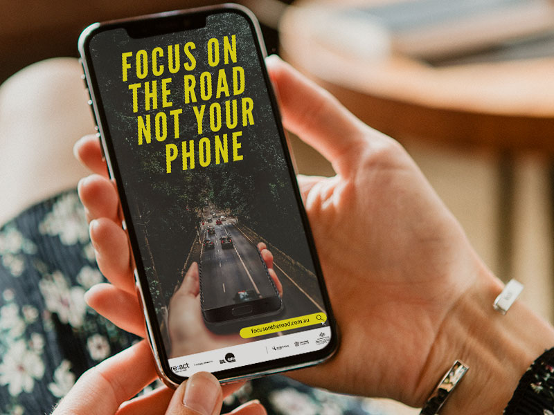 Focus on the Road not your phone! Winning Re:act and Queensland Government road safety campaign. Designed by Laura Cousins of Pixel Punch Design. Gladstone graphic designer.